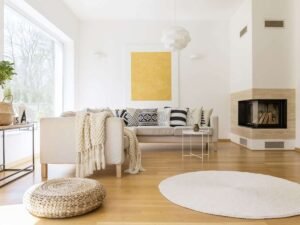sala minimalista e confortável com lareira